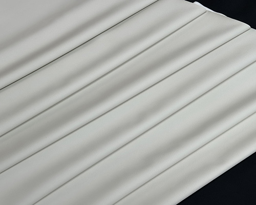 合成革硅胶皮与传统人造皮革，哪种材料更符合现代行业设计需求？